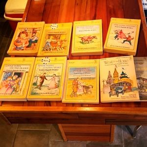 Loved and well read Little House On The Prairie soft cover books
